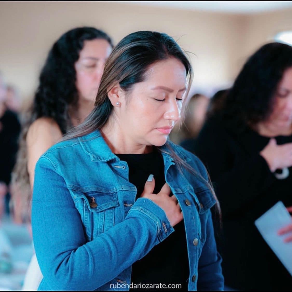 Latina women connecting at a community gathering